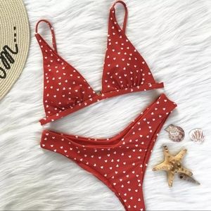 Red cheeky bikini with small white hearts